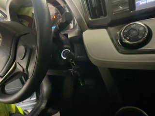 2015 Toyota RAV4 LE - Interior Steering Wheel With Keys Image